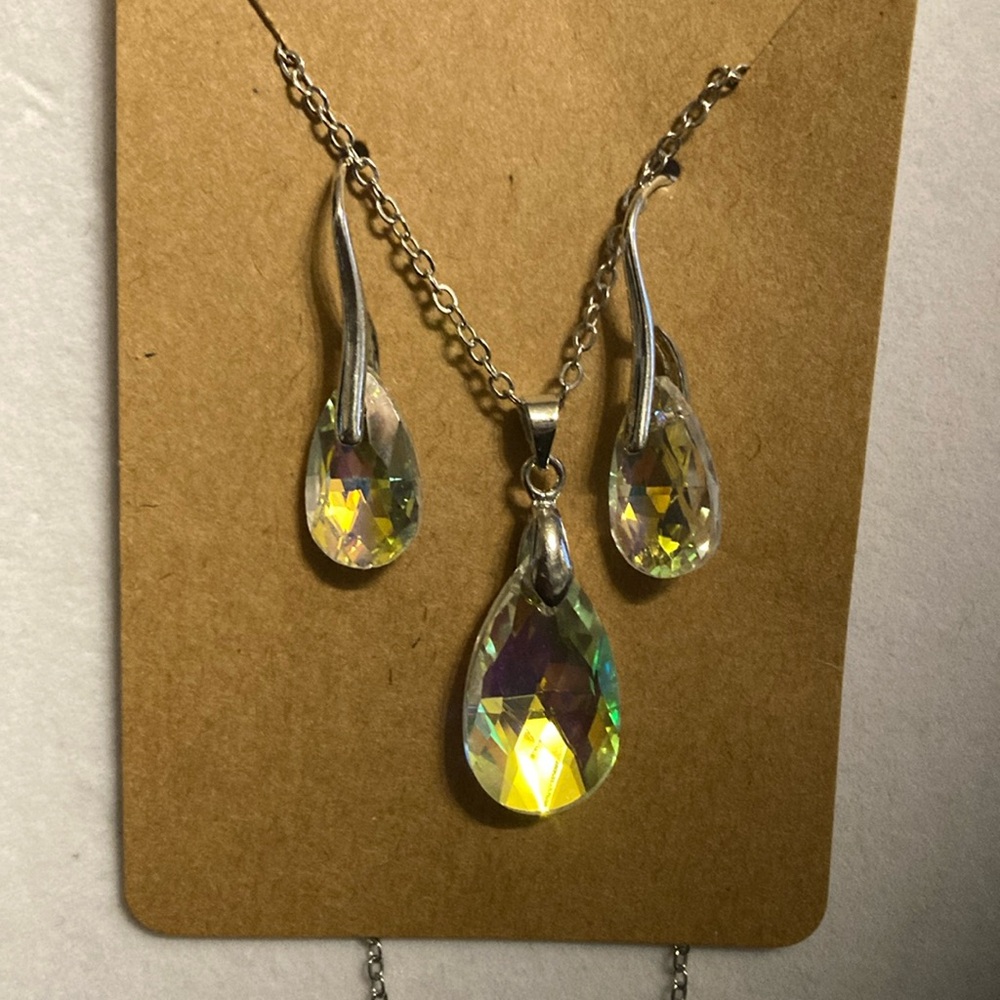 Prism style tear drop necklace and pierced dangle earrings. Pre owned condition